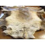 Two reindeer skin fur rugs / throws