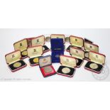 A collection of cased crowns, to include; Pobjoy Mint '25th Anniversary of the Coronation',