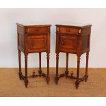 A pair of French bedside cabinets, with veined white marble tops, a drawer and cupboard door,