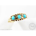 A turquoise and diamond ring seven stone ring,