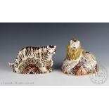 Two Royal Crown Derby paperweights comprising; a lion, with silver coloured stopper,