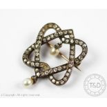 A diamond and pearl set brooch, 19th century,