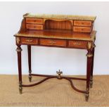 A Louis XVI style walnut and stained beech writing table with label for H & L Epstein Limited,