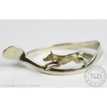 A George V silver figural wishbone napkin ring, C & C Hodgetts, Birmingham 1924,