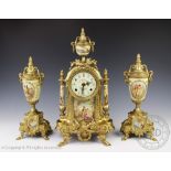 A Louis XVI style gilt metal clock garniture,