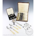 A selection of silver comprising; a cased set of six French mother of pearl handled servers,