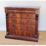 An early 19th century Scottish type mahogany and rosewood chest of drawers,