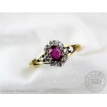 A ruby and diamond cluster ring,