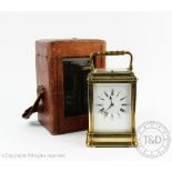 A late 19th century hour repeating brass carriage clock by Henri Jacot,