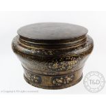 A Chinese lacquered circular box and cover, of large proportions,