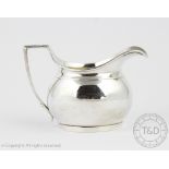 A George III silver cream jug, John Emes, London 1805,