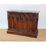 A Victorian carved walnut side cabinet,