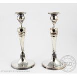 A pair of early 19th century old Sheffield plate candlestick,