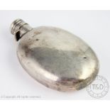 A Victorian silver oval hip flask Sampson Mordan & Co, London 1887, of concave form and bayonet cap,