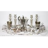 A selection of mixed silver plated wares, to include; an elegant oil and vinegar bottle set,