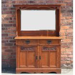 An Edwardian Arts and Crafts style oak dresser,