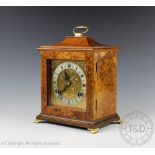 A Goldsmiths & Silversmiths Co Ltd walnut eight day mantel clock,