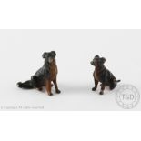 Two cold painted bronze miniature dogs, both modelled seated and with enamelled highlights,