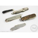 A silver cased multi tool folding knife, A Barrett & Sons 63 & 64 Piccadilly, London 1907,