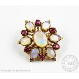 An opal and ruby set 9ct yellow gold brooch/pendant, London 1984,