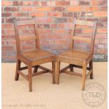 A part set of five 19th century country kitchen chairs, with bar backs and solid seats,
