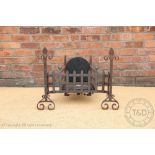 A 19th century style cast iron fire grate,