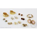 A collection of earrings, to include; a pair of aquamarine coloured stone set studs,