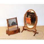 A 19th century mahogany bow front dressing table mirror, with one drawer, on ogee bracket feet,