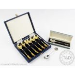 A cased set of six silver gilt 'Kinge Arthur' spoons, Birmingham Mint 1978,