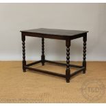 An 18th century and later oak side table, with rounded rectangular top,