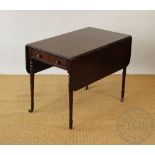 A Regency mahogany Pembroke table, with drawer, on ring turned and tapered legs,