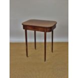 An early 19th century mahogany side table, with rounded corners, on tapered legs,