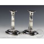 A pair of late Victorian silver candlesticks, Harrison Brothers and Howson, Sheffield 1898,