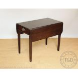 A George III mahogany Pembroke table, with drawer, on tapered square legs,