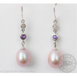 A pair of freshwater pearl, amethyst and diamond set drop earrings, each designed as a diamond,