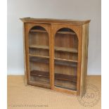 A Victorian golden oak bookcase,