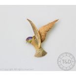 A gold and enamelled bird of prey brooch, 'JG & S' Birmingham 1954,