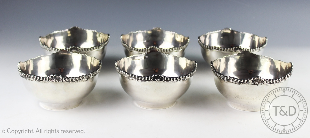 A set of six '900' standard silver finger bowls,