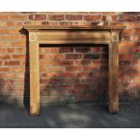 A George III style carved pine fire surround, with fluted detailing, aperture 90cm x 90.