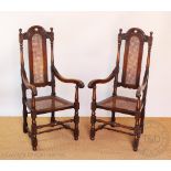A pair of Carolean style oak side chairs,