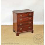 A George III style mahogany chest, with four long drawers, on bracket feet,