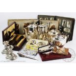 A selection of silver and silver plated items to include; two silver handled button hooks,