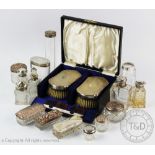 A cased silver backed travelling three piece brush set, William Comyns & Sons Ltd , London 1937,