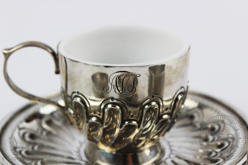 A Victorian silver tea cup and saucer, London 1896, the cup with milk glass liner, - Image 2 of 3