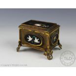 After Cesare Roccheggiani, a 19th century pietra dura gilt metal casket stamped 'Guttin',