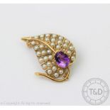 An amethyst and seed pearl set 'leaf' form brooch, Birmingham 1963,