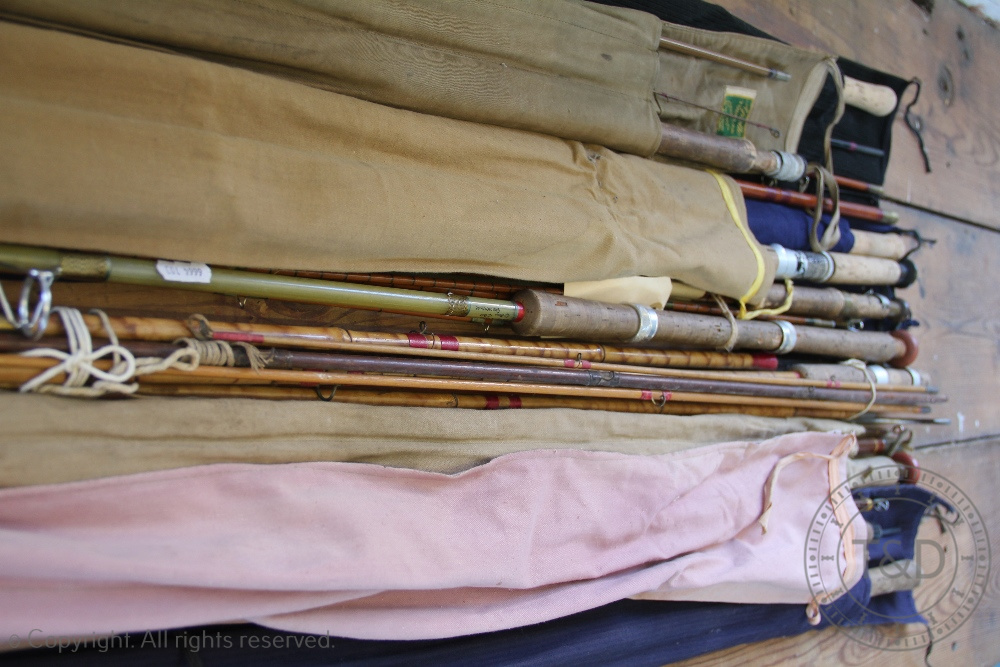 A miscellany of fishing rods and rod sections, split cane, whole cane and fibreglass, - Image 2 of 3