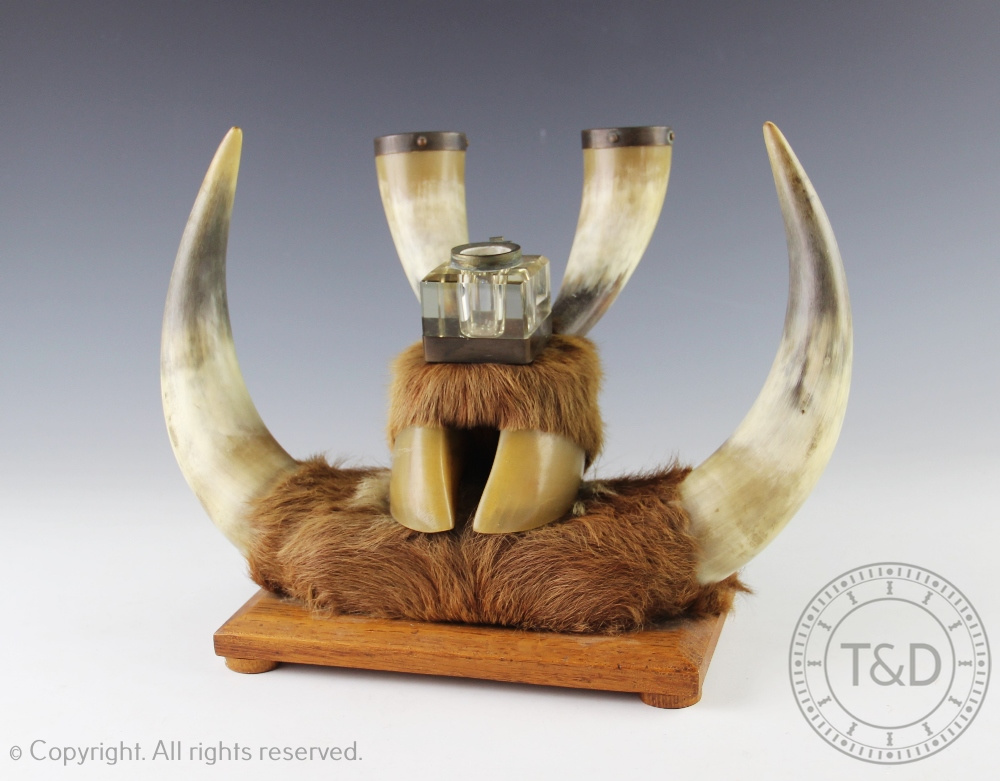 A large bovine horn desk stand,