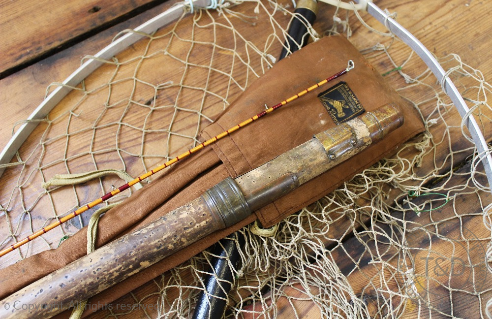 A Hardy's two piece split cane fishing fishing rod, numbered '52331' and '16.8.