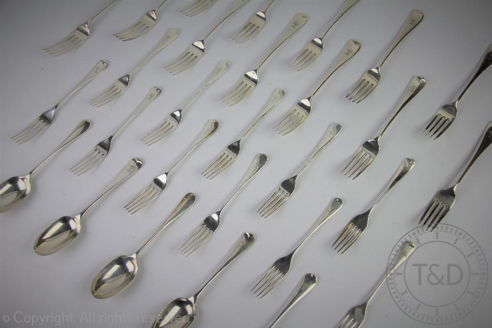 An assembled suite of old English pattern silver cutlery comprising; twelve dinner forks, - Image 2 of 4